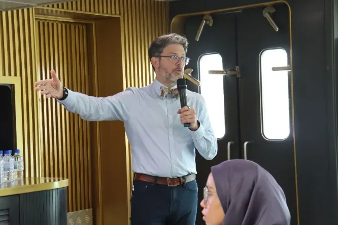 Michael Bachman taking questions from the room